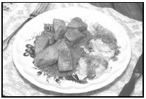 Kure Na Paprice (Chicken Paprikas), a favorite Czech dish, is typically served with knedlíky (dumplings). EPD Photos