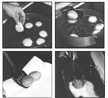 Drop balls of dough into hot oil. Then sprinkle the finished baursaki with sugar. EPD Photos