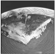 A wedge of Tortilla Española, ready to be served. EPD Photos