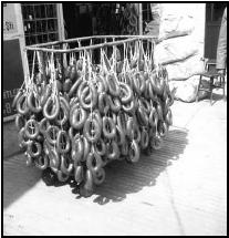 Rings of sucuk (spicy sausage) hang outside the butcher shop. Sucuk may be part of a dinner menu all year round. EPD Photos/Cyril Gonsorcik