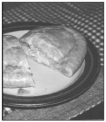 Pasties—pastry filled with a mixture of beef, lamb, or chicken combined with potatoes, and vegetables—may be eaten warm or cold. EPD Photos